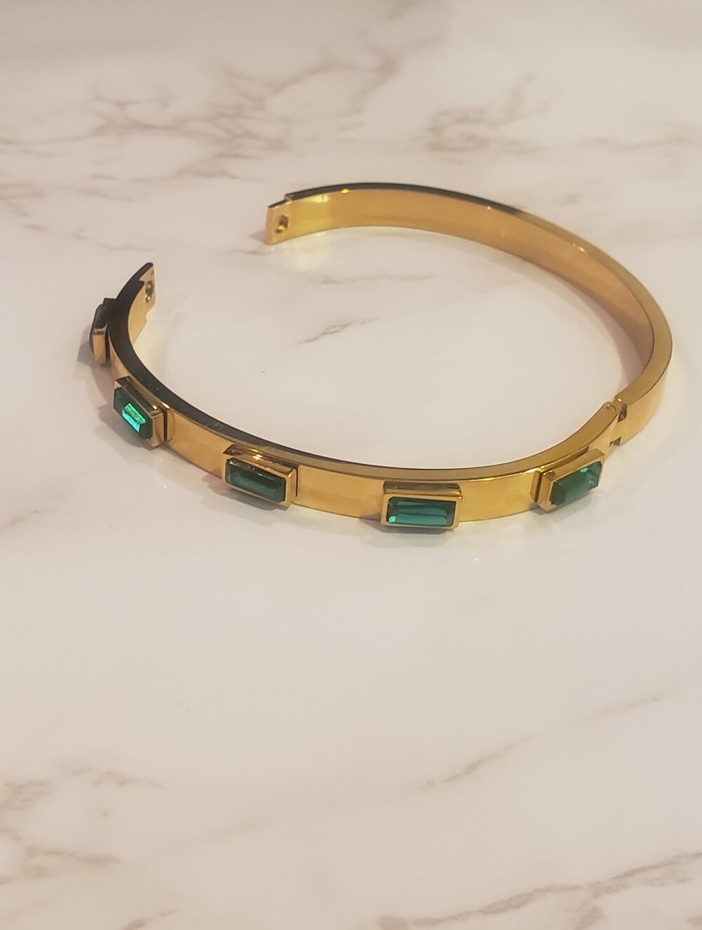 Gold Tone Bangle Bracelet with Green Emerald-Cut Stones NWOT